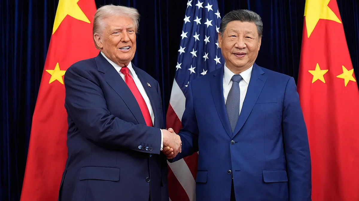 File photo of Donald Trump and Xi Jinping before a meeting in Busan, South Korea