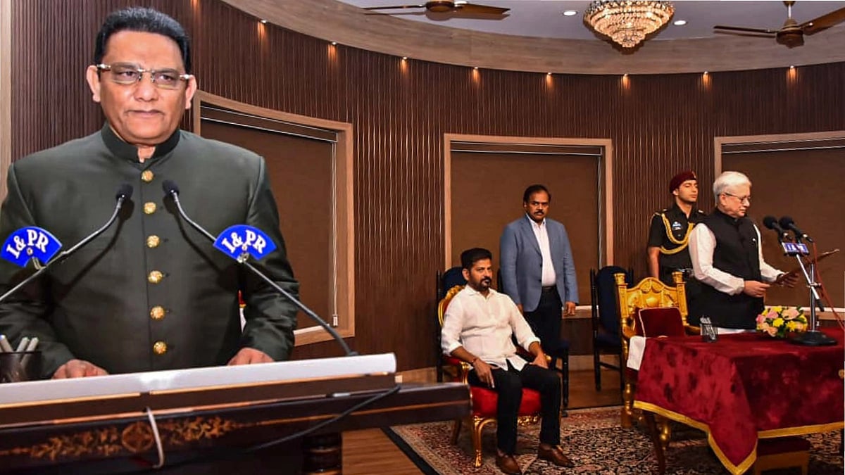 Mohammad Azharuddin taking oath as Telangana minister. (Photo: PTI)