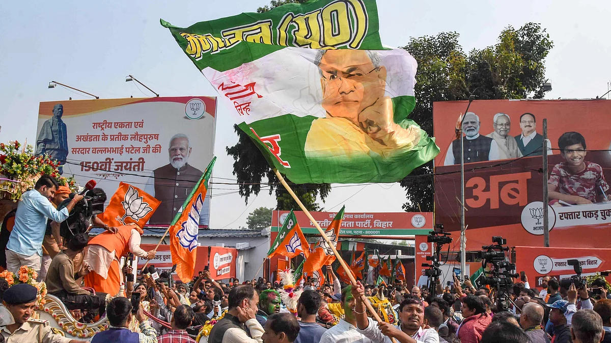 NDA supporters celebrate victory at the party office in Patna (photo: PTI)
