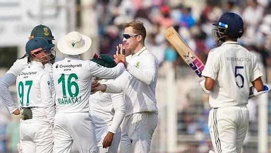 Player of the Match Simon Harmer jubilates with his teammates at the Eden