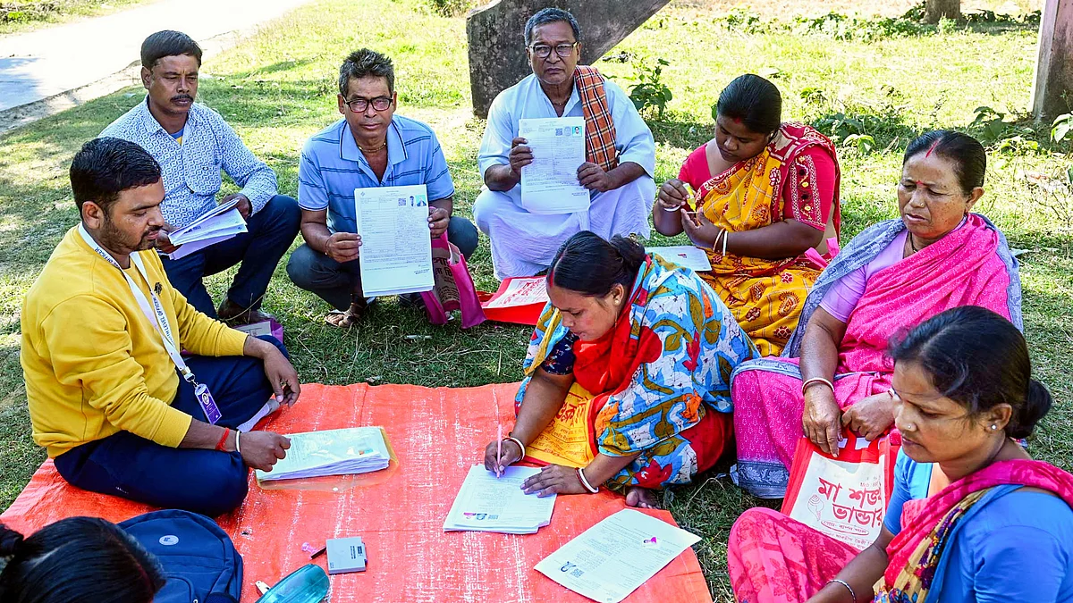 A BLO supervises enumeration under the SIR exercise in Malda, West Bengal.