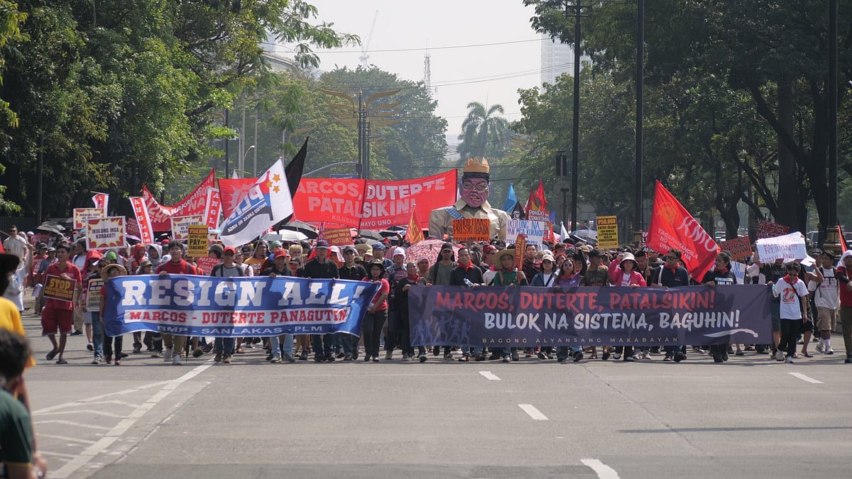 Tens of thousands rally in Manila demanding Marcos’ resignation over corruption scandal