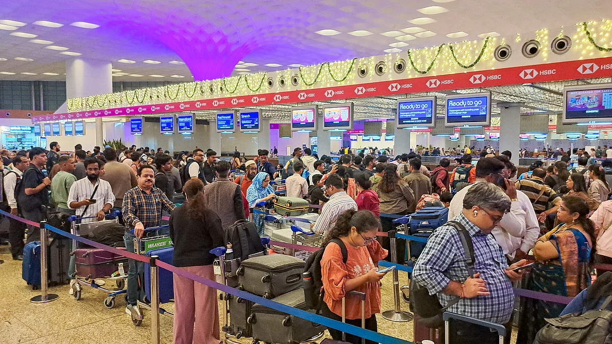 Stranded passengers at the IndiGo counter at Chhatrapati Shivaji Maharaj Airport, in Mumbai, 5 Dec