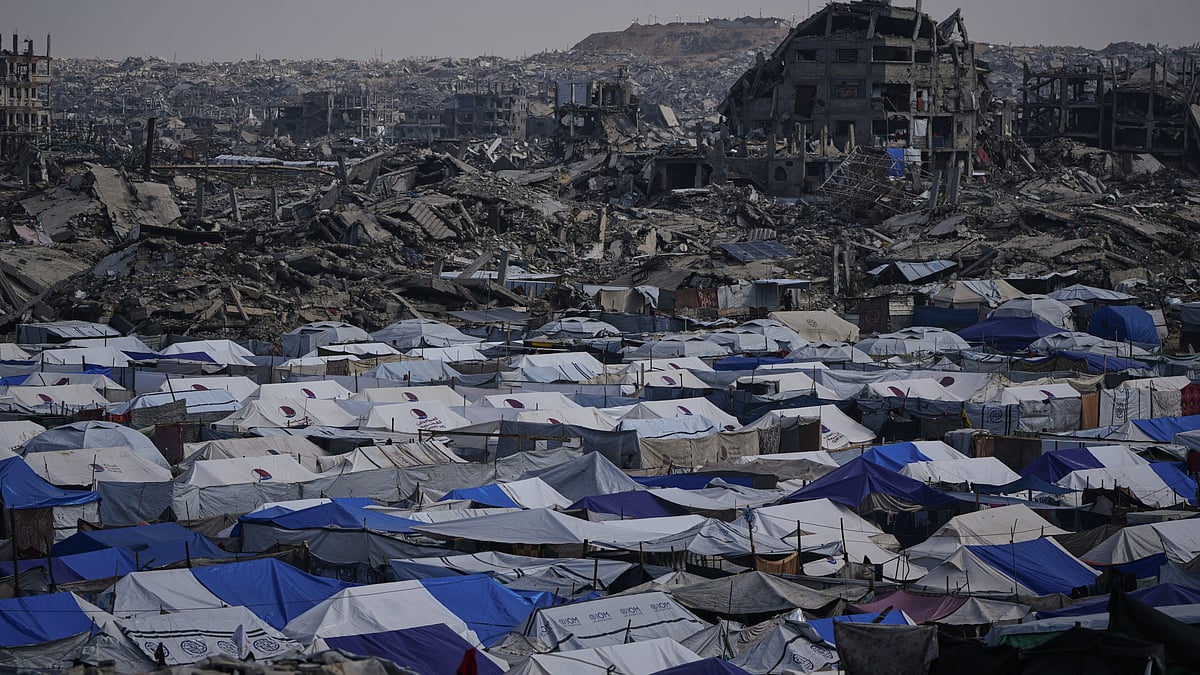Tents of displaced Palestinians stand amid the ruins left by Israel’s assault on Gaza City.
