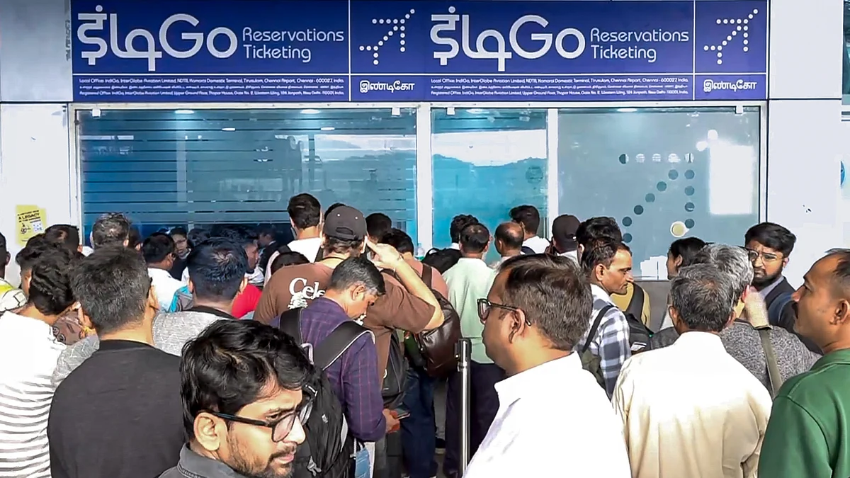 IndiGo passengers wait anxiously at the airline’s counter in Chennai.