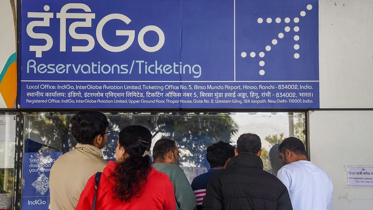 Passengers at an IndiGo airlines counter.