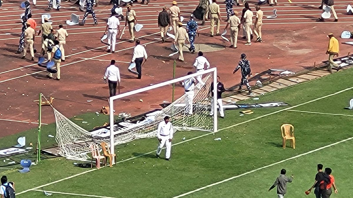 Fans react in anger as chaos erupts at Salt Lake Stadium during Lionel Messi’s visit.