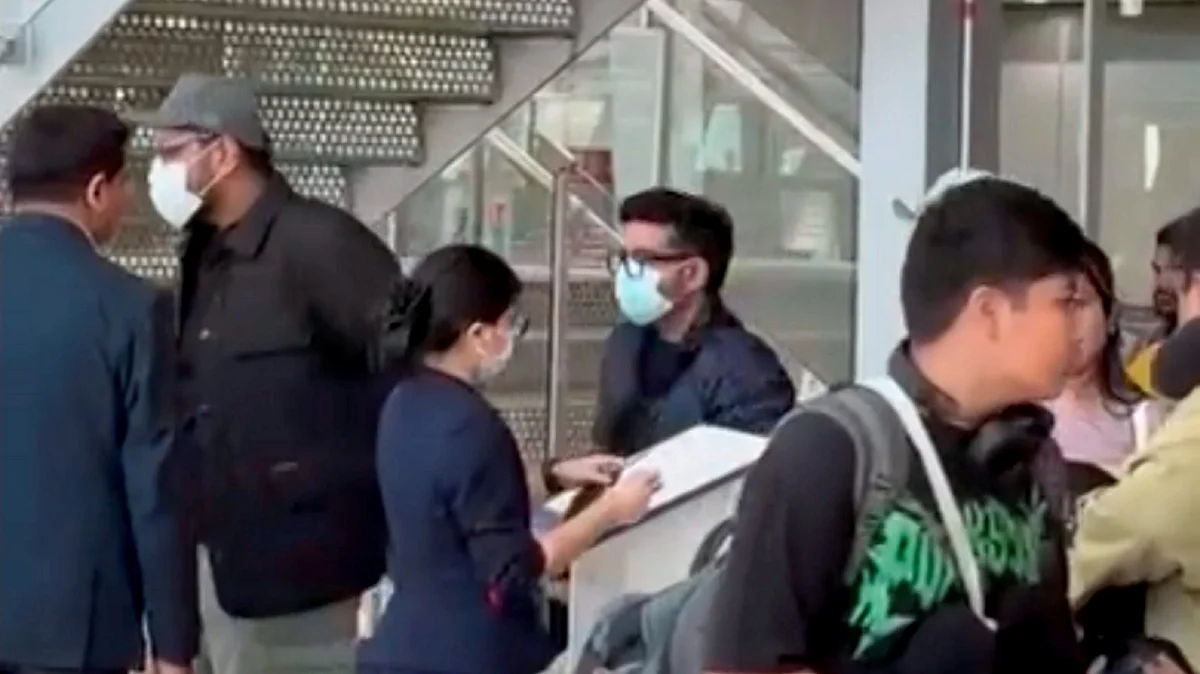 Saurabh and Gaurav Luthra at Bangkok airport on 16 December (photo: PTI) 