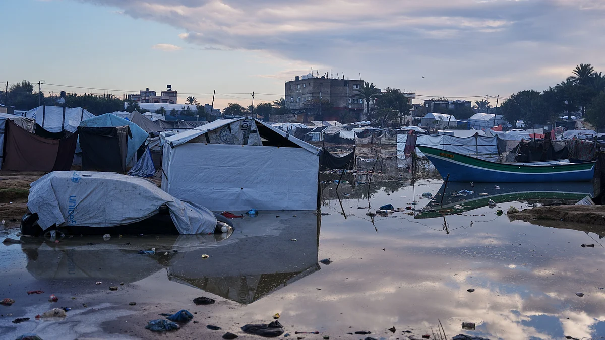 Heavy rain inundates a makeshift camp in Gaza Strip.