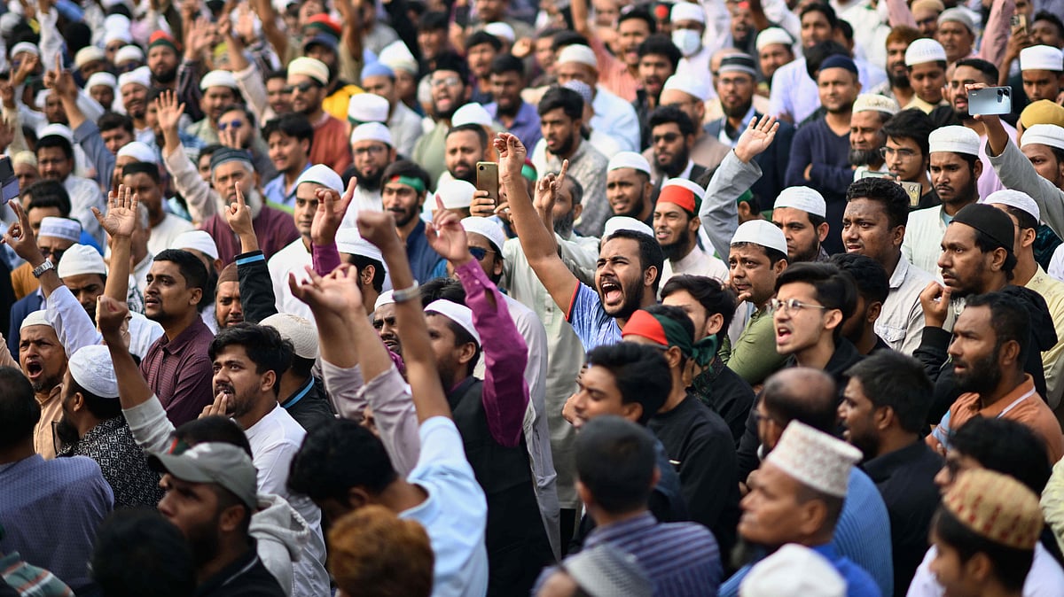 Citizens mourn slain activist Sharif Osman Hadi outside Bangladesh Parliament in Dhaka.