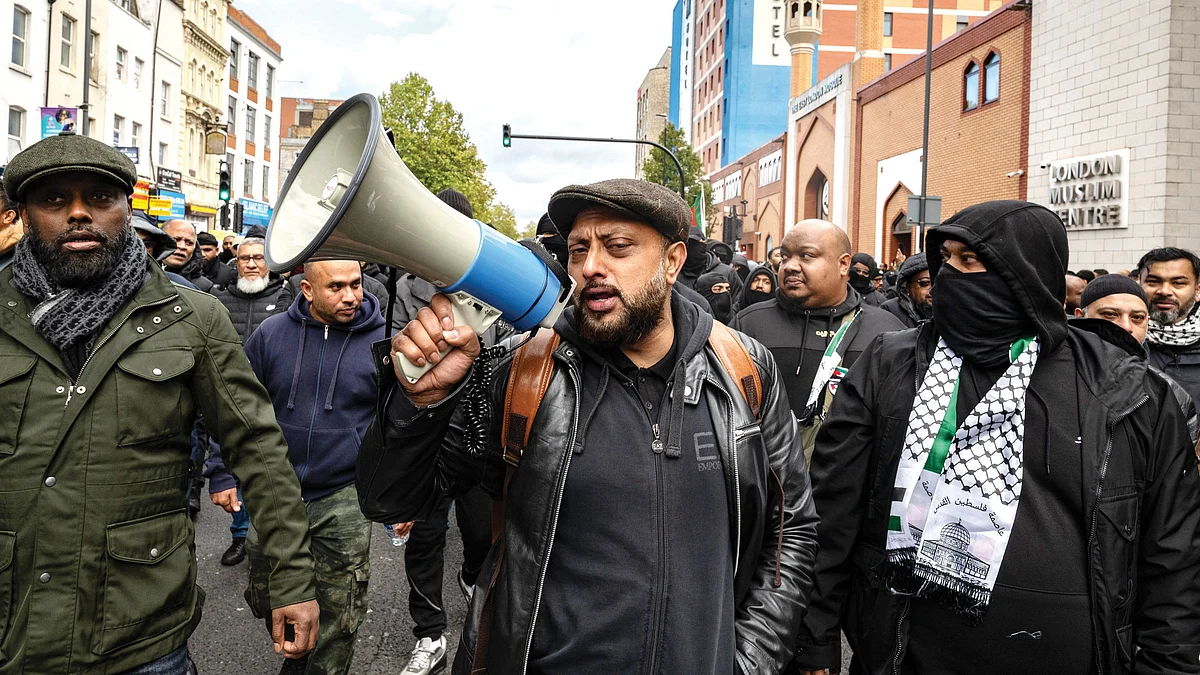 Bangladeshis march to Altab Ali park, named after the victim of a racist murder in London
