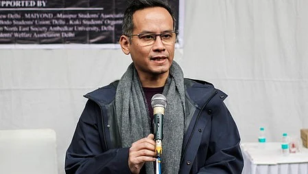 Gaurav Gogoi speaks during a meeting.