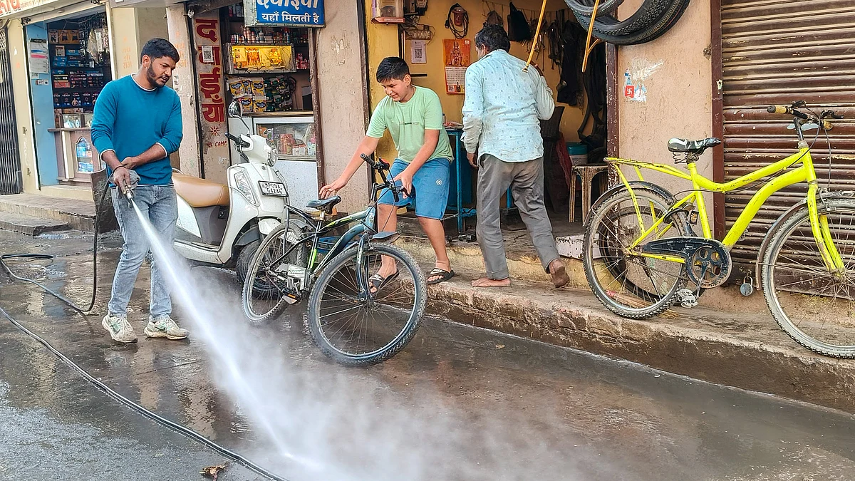 IMC workers conduct a cleanliness drive in Bhagirathpura.
