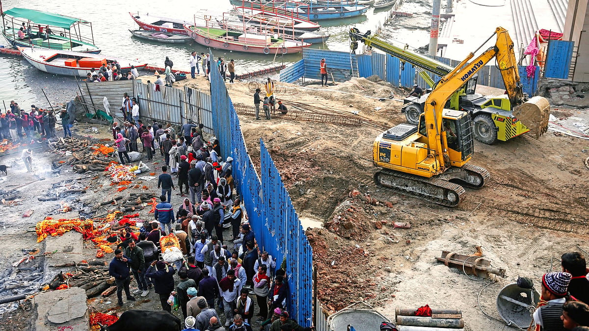 Cremations continue at Manikarnika ghat even as one side is being flattened to give it a new look