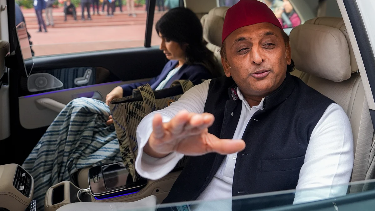 Akhilesh Yadav and Dimple Yadav during the Budget session of Parliament in New Delhi.