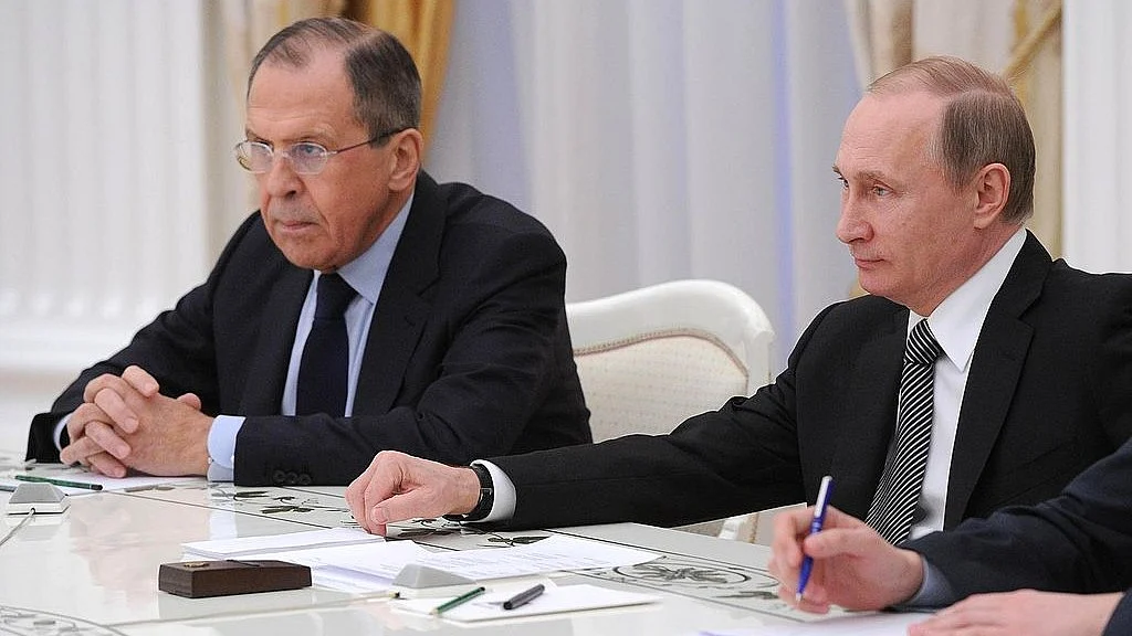 Russian President Vladimir Putin with Foreign Minister Sergei Lavrov