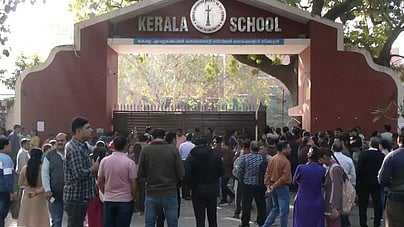 Parents wait outside a school as CBSE Class 10 and 12 exams commence across the country.