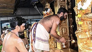 Priests offering prayers at Sabarimala temple