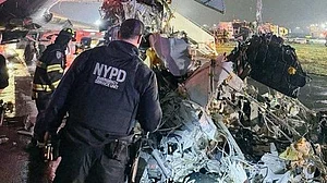 Two pilots killed as plane collides with fire truck at New York airport