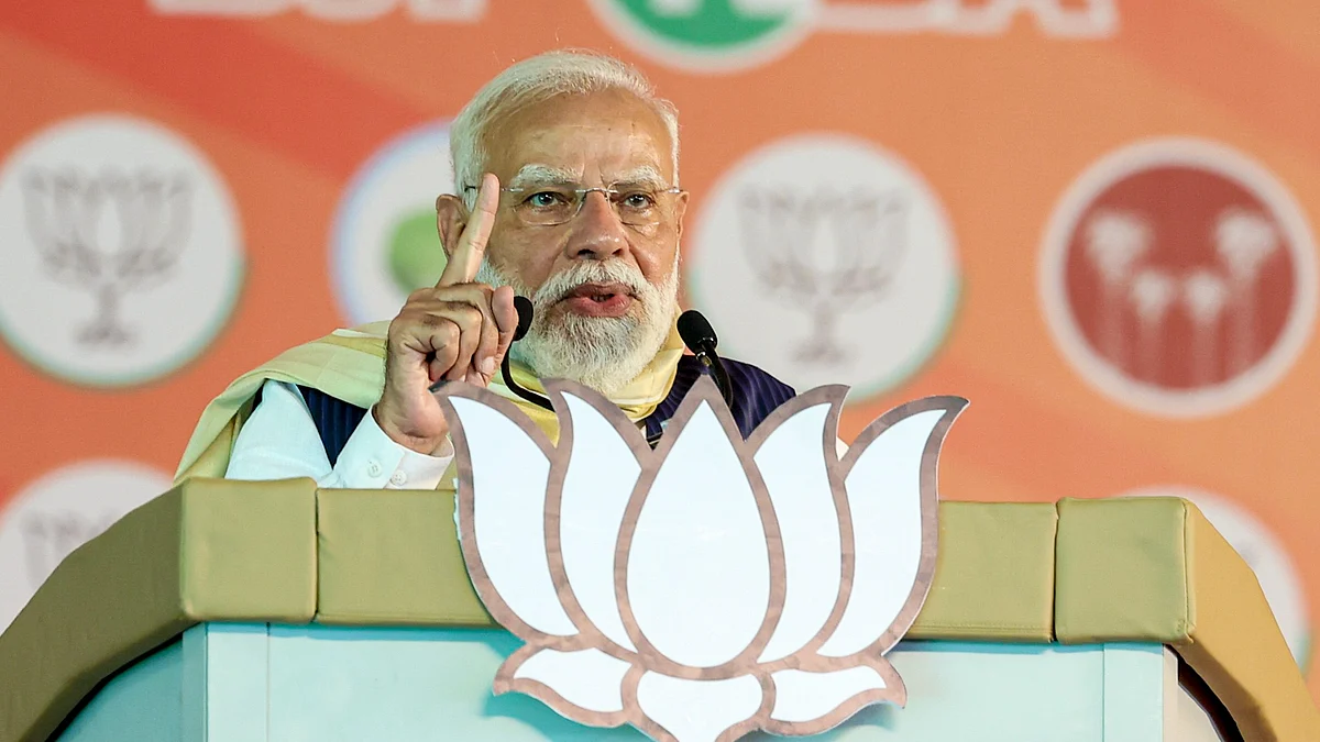Narendra Modi addresses a public meeting in Thiruvalla.