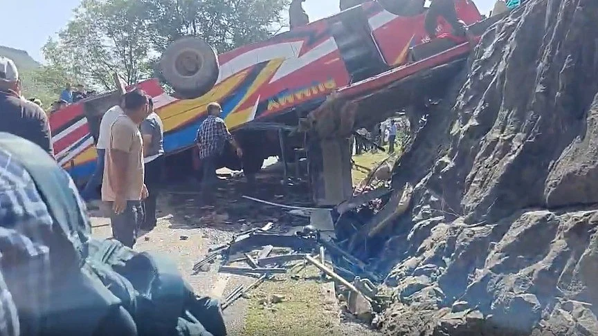 The overturned bus in Udhampur.