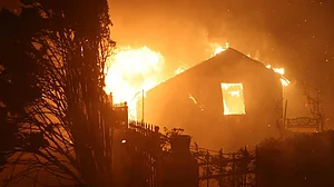 Wildfires rage across southeastern US, trigger evacuations and destroy homes