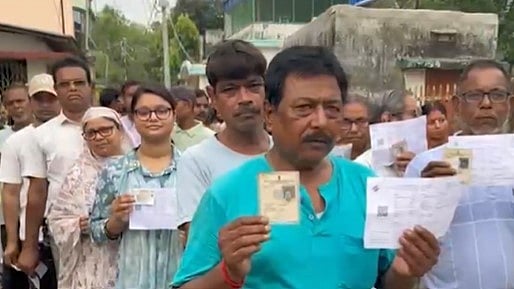 File photo of voters lining up at a polling station in West Bengal 