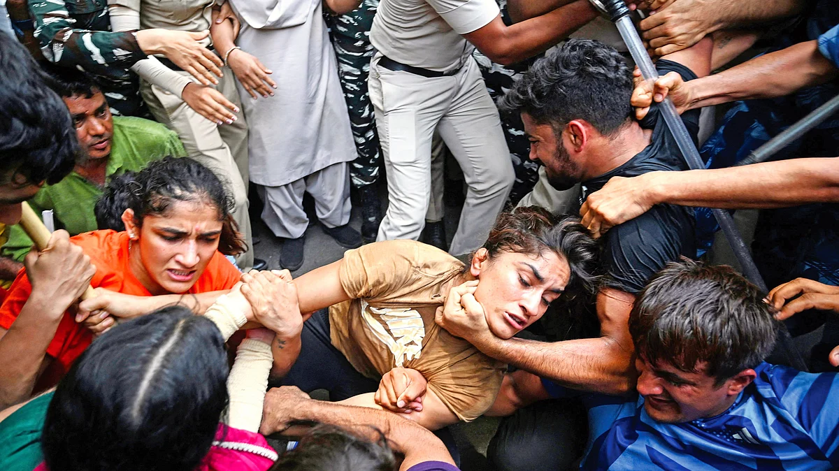 Olympian Vinesh Phogat (C) and others at the 2023 wrestlers' protest against Brij Bhushan Singh