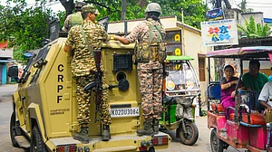 CRPF personnel on a light-armoured personnel carrier in Howrah, 29 April