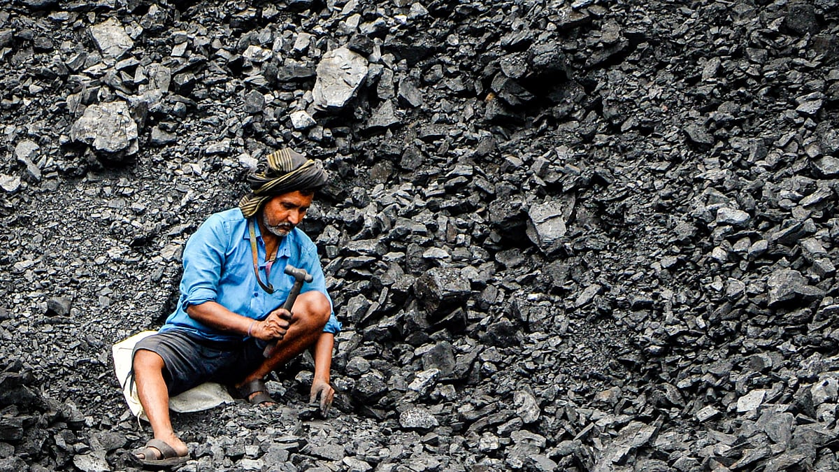 A coal depot worker in West Bengal. Echoes of Chicago 1886?