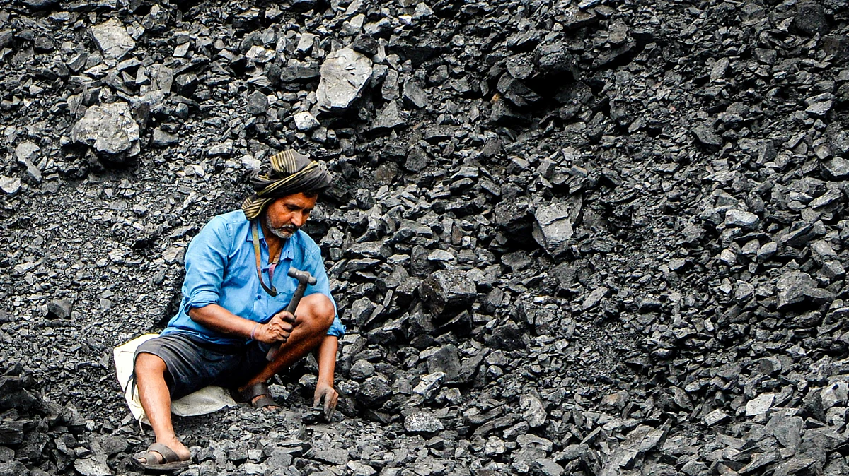 A coal depot worker in West Bengal. Echoes of Chicago 1886?