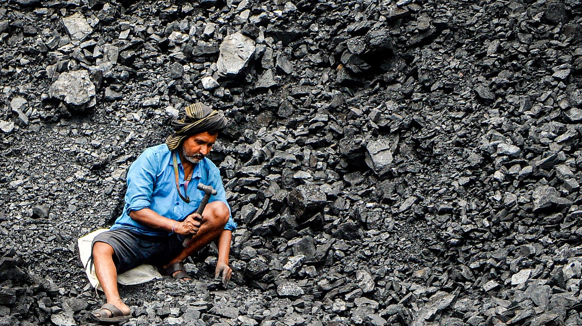 A coal depot worker in West Bengal. Echoes of Chicago 1886?