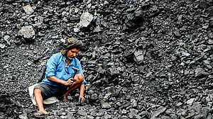 A coal depot worker in West Bengal. Echoes of Chicago 1886?
