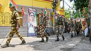 Security personnel patrol on the eve of counting, in Howrah, 3 May