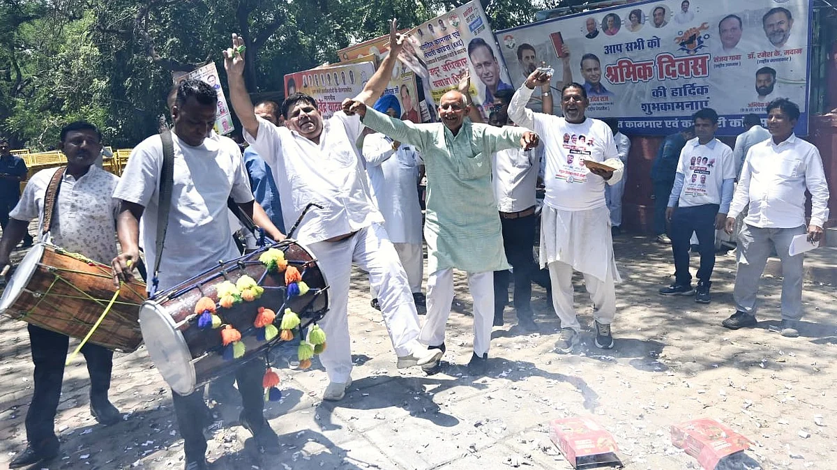 Congress workers celebrate the Kerala win in New Delhi
