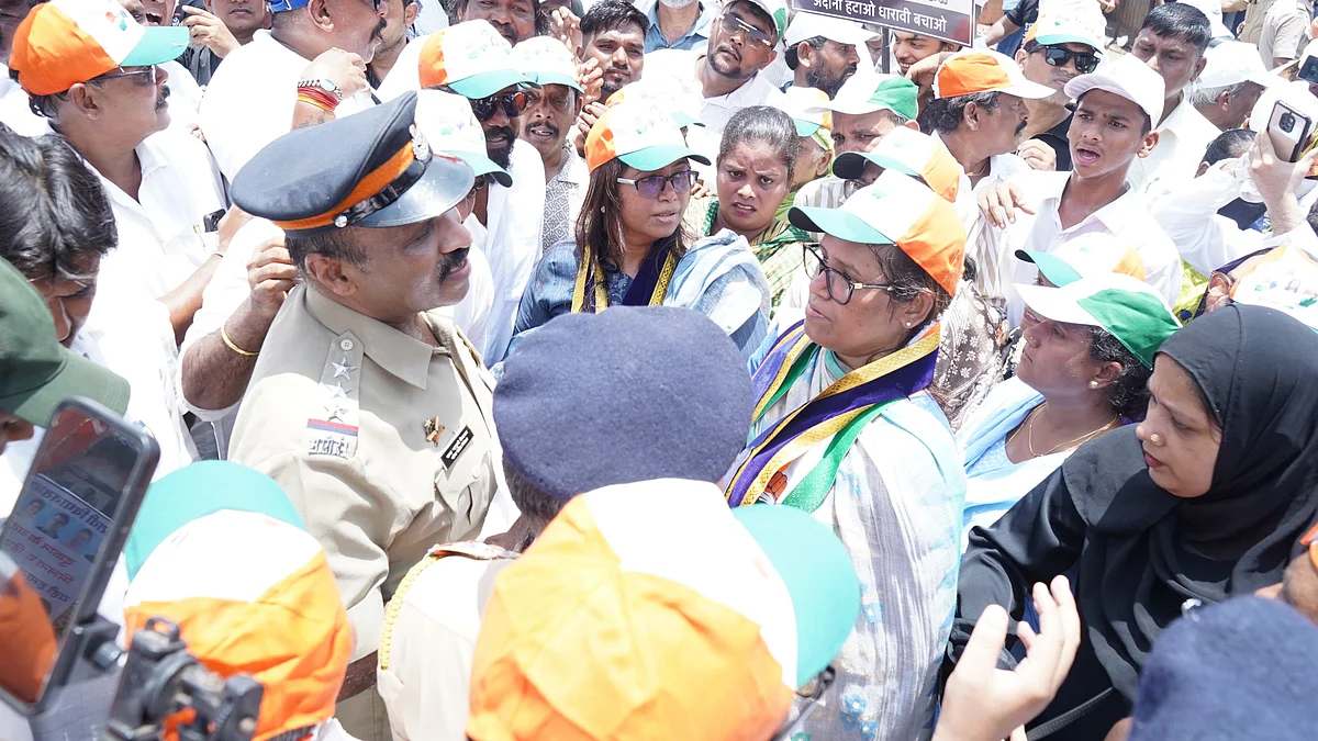 Dharavi residents march against Adani and Maharashtra govt