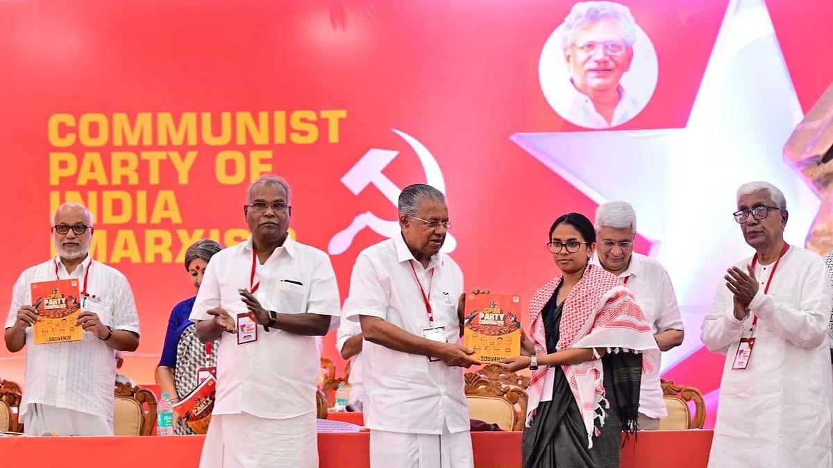 File photo of outgoing CM Pinarayi Vijayan (C)