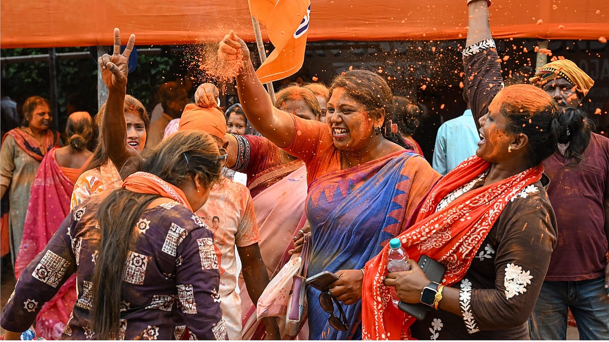 BJP supporters celebrate at Ranaghat, in Nadia, 4 May