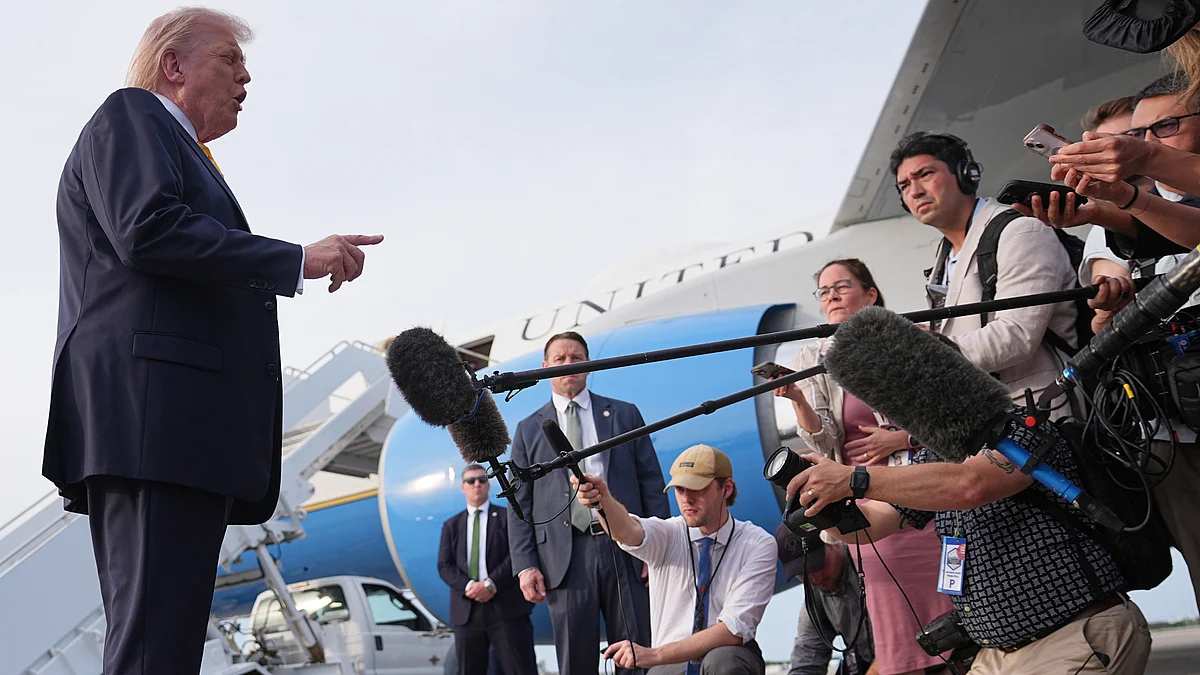 Donald Trump speaks to reporters in West Palm Beach, Florida.