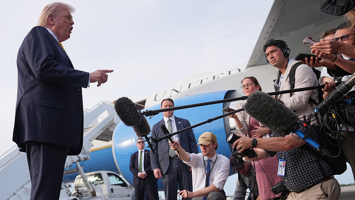 Donald Trump speaks to reporters in West Palm Beach, Florida.