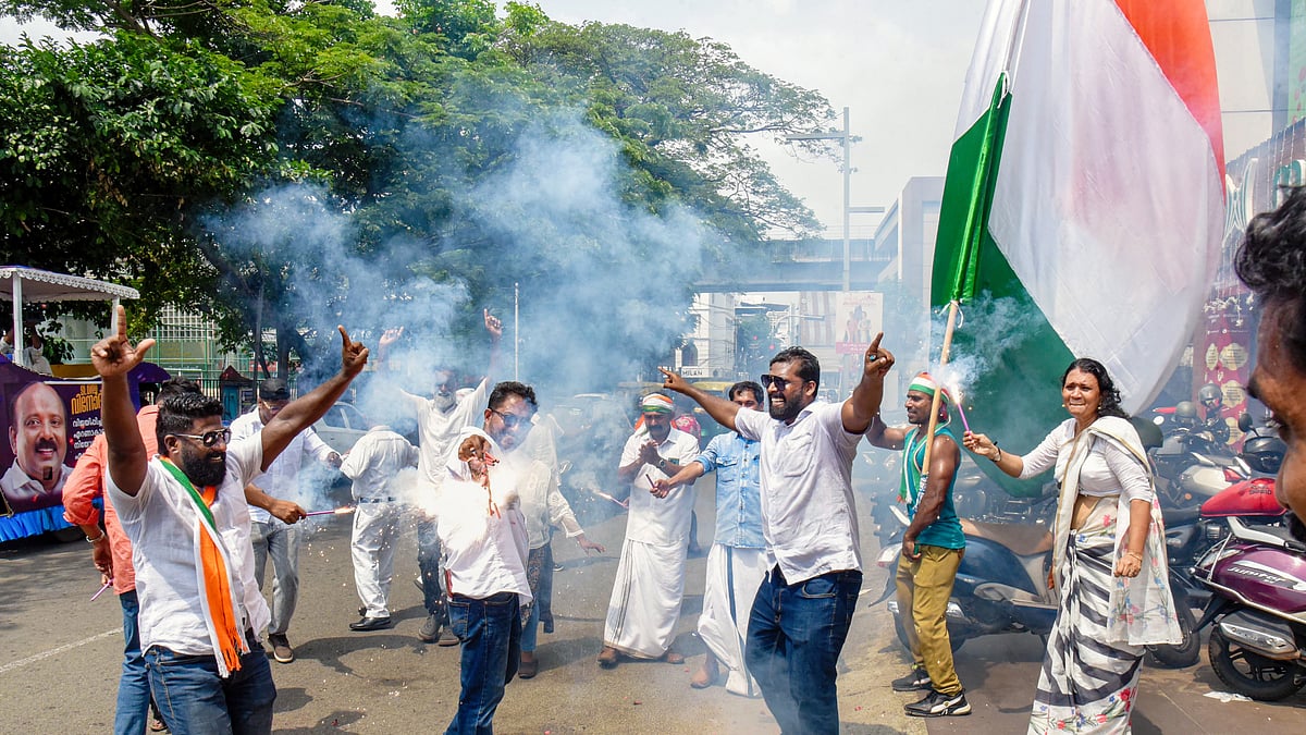 UDF supporters celebrate the Kerala Assembly election results, at Kochi, 4 May