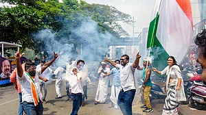UDF supporters celebrate the Kerala Assembly election results, at Kochi, 4 May