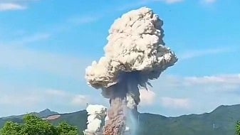 Smoke plumes tower over the explosion site in central China’s Hunan province.
