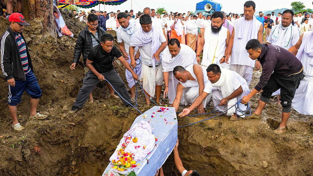 Last rites performed for two children killed in a bomb attack in April, in Bishnupur district, 2 May