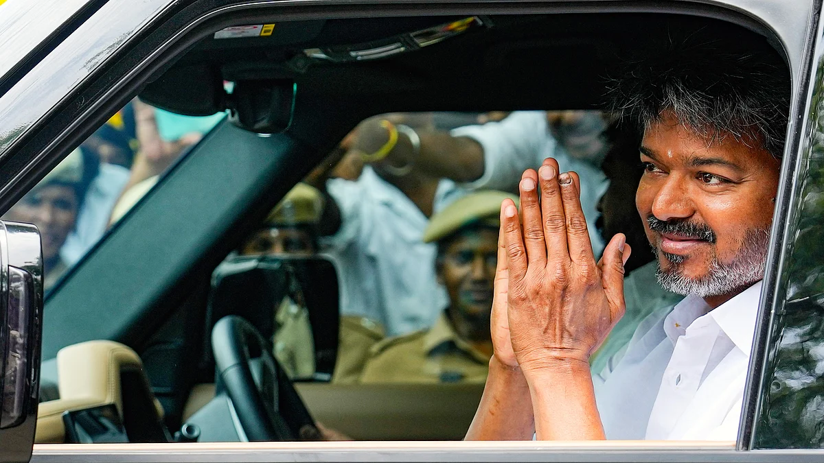 TVK)chief Vijay arrives at the party HQ at Panaiyur, in Chennai, 5 May