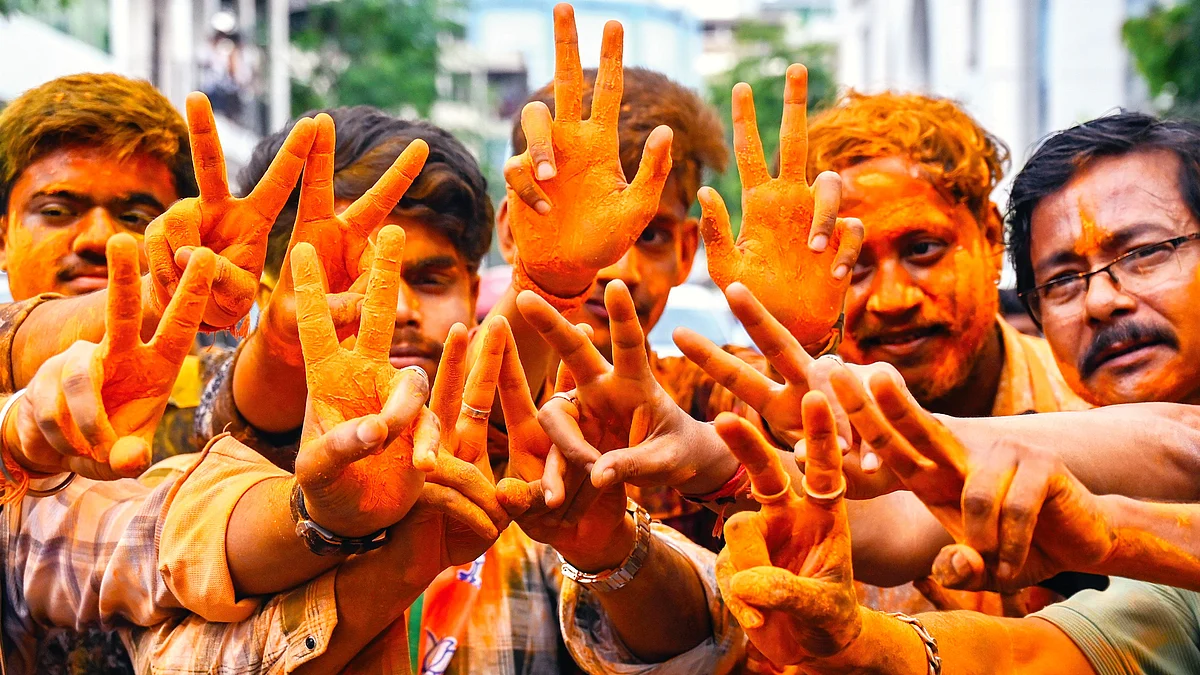 BJP workers in Kolkata celebrate the brute majority the party won on 4 May