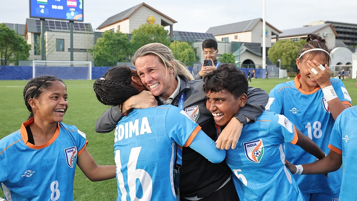 Head coach Pamela Conti with the ecstatic girls after India made the quarters
