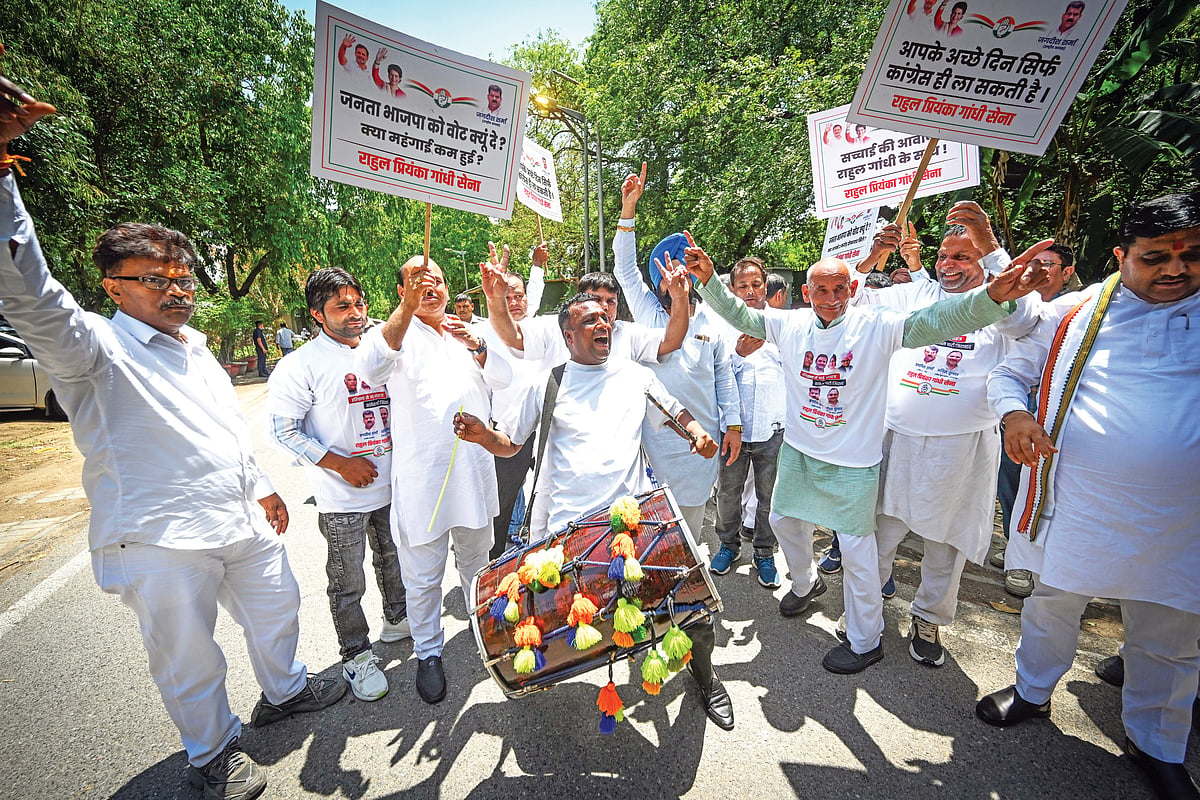 Drums and dance outside the Congress office in New Delhi