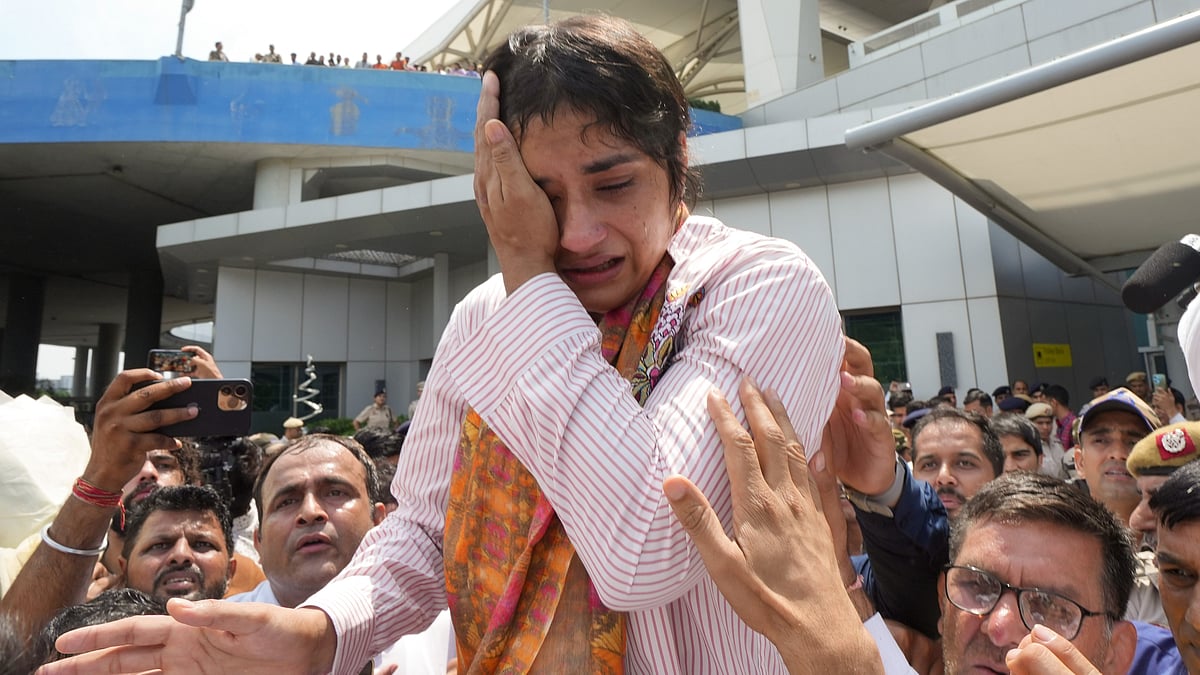 Wrestling Federation of India issues a show-cause notice to wrestler Phogat for indiscipline.