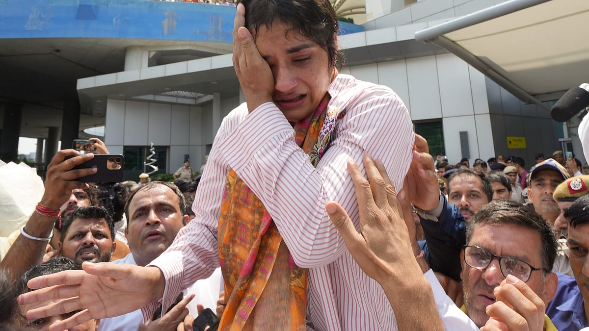 Vinesh Phogat gets emotional as she arrives at IGI airport, New Delhi.